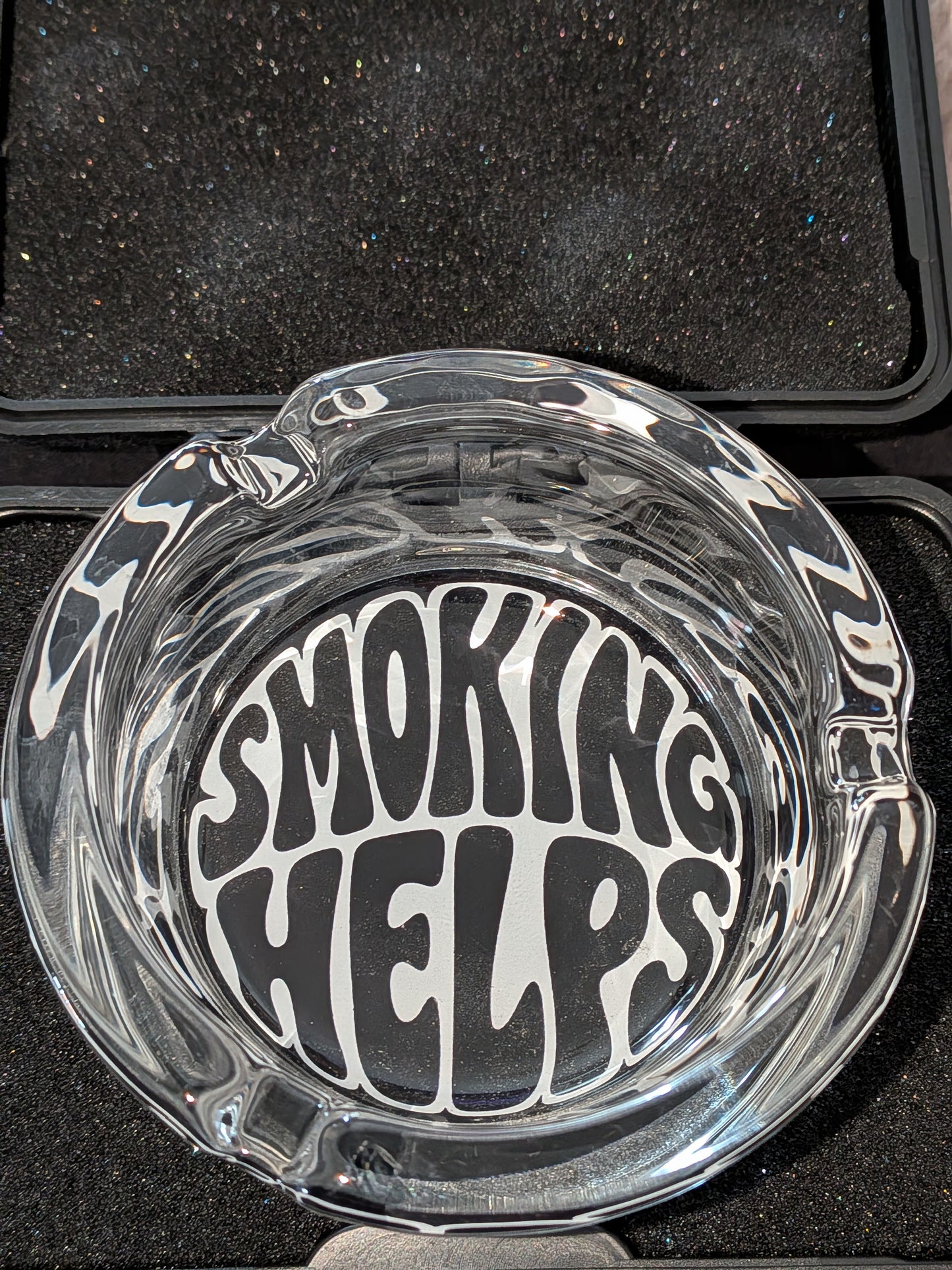 Smoking helps glass ashtray