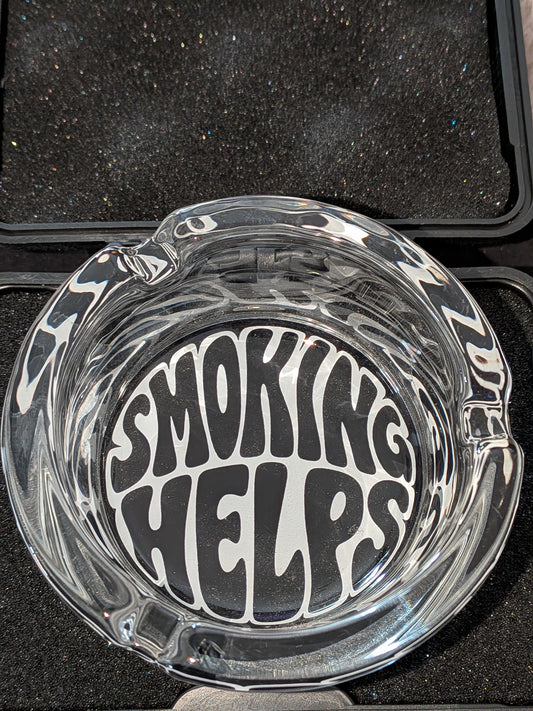 Smoking helps glass ashtray
